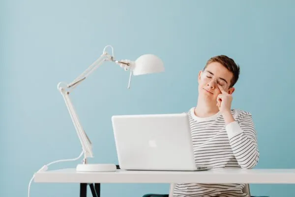 man looking at computer